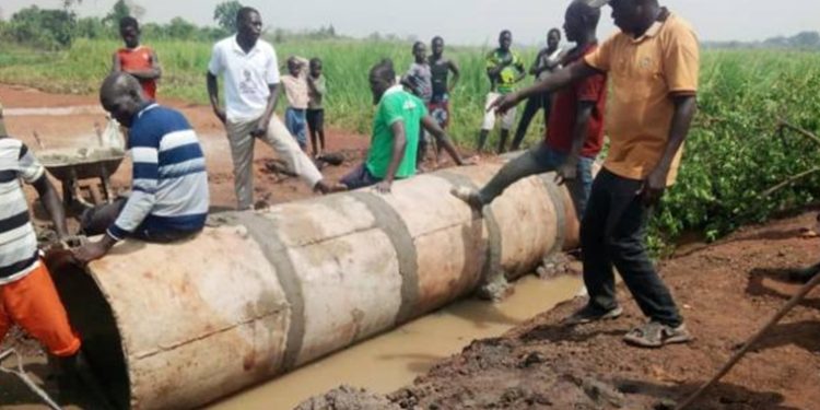 Nwoya Locals Raise Funds for Culvert Installation on Flood Prone Road