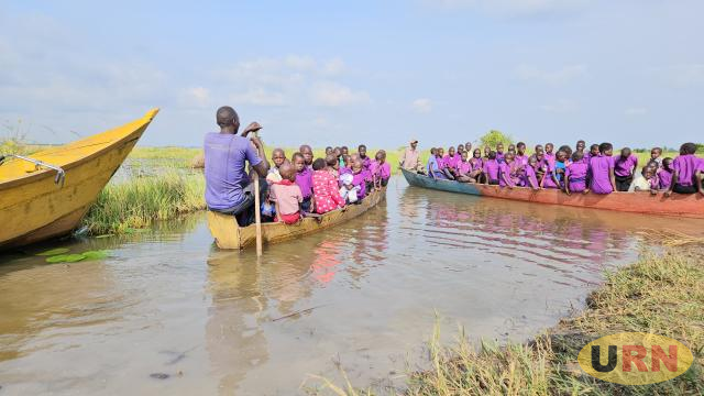 Abalang Pupils Risk Floodwaters in Daily Journey to School