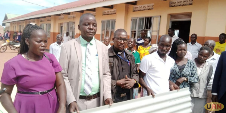 OPM Delivers 400 Iron Sheets to Re-roof Storm-Damaged Omoro Schools